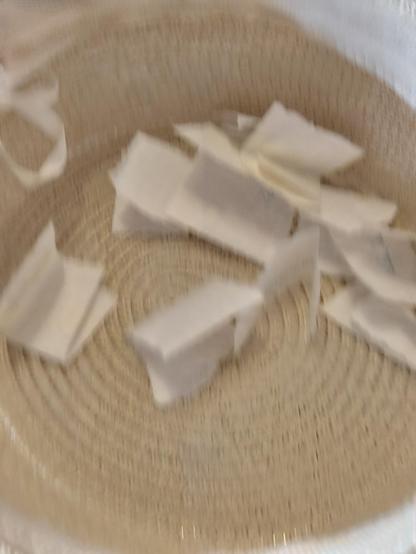 Several folded papers in a hat. 